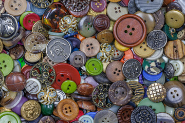 Close-up of variety of buttons.