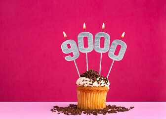 Candle number 9000 - Number of followers or likes.