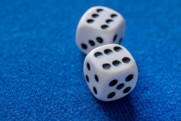 Two Dices on a blue backgammon board
