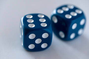 Two Blue Dices on a white table