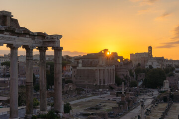Obraz premium Sunrise over the Roman Forum and archaeological zone encompassing the ancient site. Rome, Italy