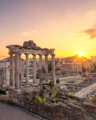 Sunrise over the Roman Forum and archaeological zone encompassing the ancient site. Rome, Italy