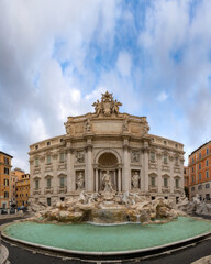 Naklejka premium Panorama of the historic Trevi Fountain under a beautiful blue sky in Rome, Italy. 
