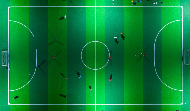Aerial top view from flying drone of the football field