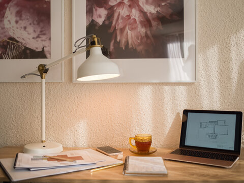 Architecture plans on desk