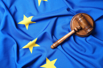 Judge's gavel on flag of European Union, top view. Space for text
