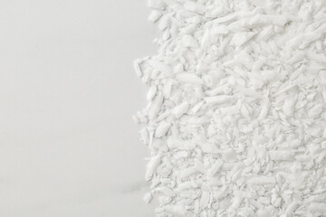 Soy wax on white marble table, top view