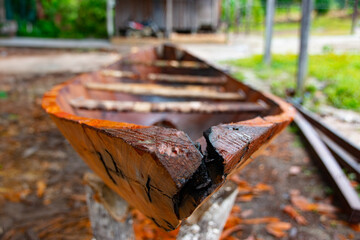 Wooden canoe being carved, focus on detail, Rio Arapiuns, Pará.