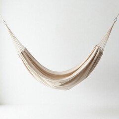 minimalist white hammock hanging against a white wall