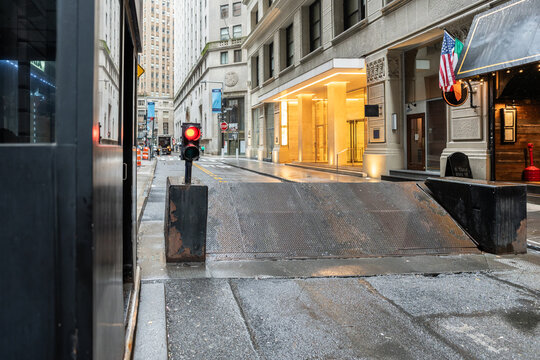 Retractable bollards protecting building entrance in manhattan
