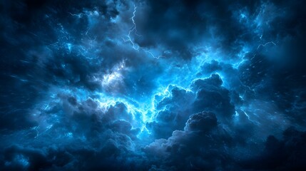 Fototapeta premium A dramatic blue stormy sky filled with thunderous clouds and flashes of lightning.
