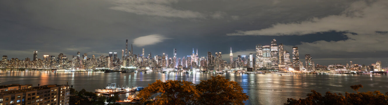 New York City Skyline Reflecting on Hudson River at Night