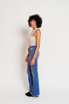 Young woman poses confidently