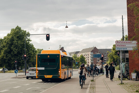 Public transport in Copenhagen with a bus and pedestrians and cyclists