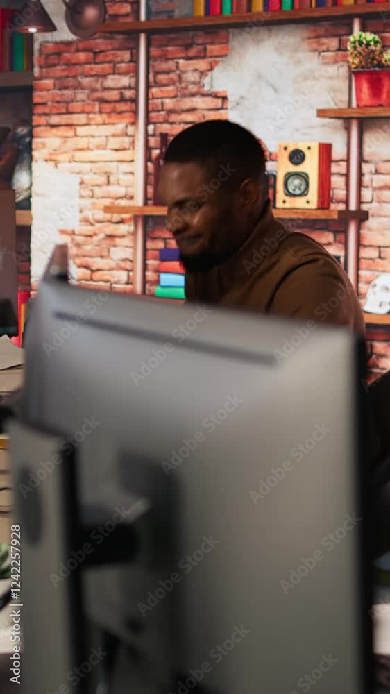Fototapete vertical video irked man punching startup office desk in frustration struggling to fix application e
