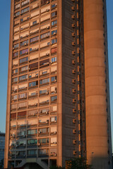 Brutalism socialist architecture buildings of Genex Tower or Western City Gate in New Belgrade Block district at sunset