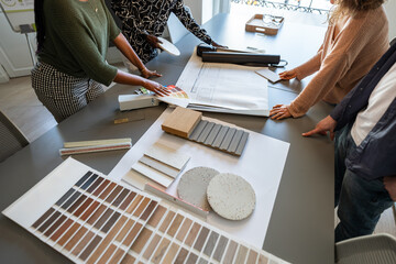 Architects choosing material samples for building design