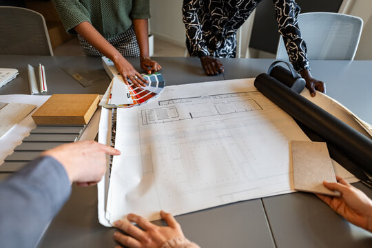 Architects choosing color palettes and materials for building project