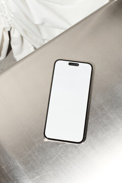 A mobile phone with white screen