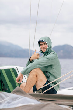 Man Smiling Showing Thumbs Up