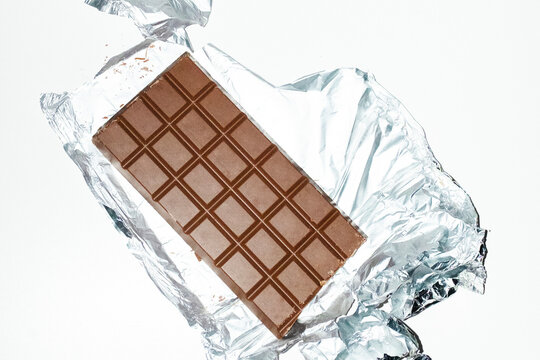 Sweet candy delicious tasty chocolate bar with hard direct flash