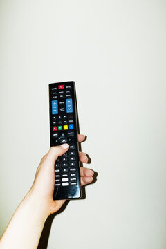 Pov/point of view of person switching on and watching tv television 