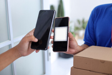 Close-up Hand Making Online Cashless Payment Using Barcode On Smartphone For Food Delivery Service