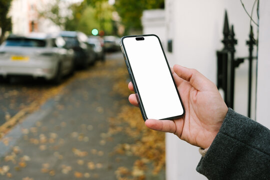 Phone at Notting Hill sidewalk