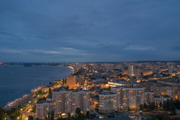 Obraz premium Saratov city, Russia. Aerial panoramic view to urban cityscape landscape at night