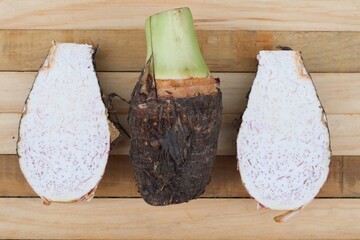 Fresh taro raw on wood background