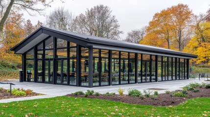 Fototapeta premium Modern steel and glass pavilion with an open concept design.