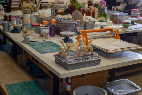 Artist's studio with tools, paints and equipment