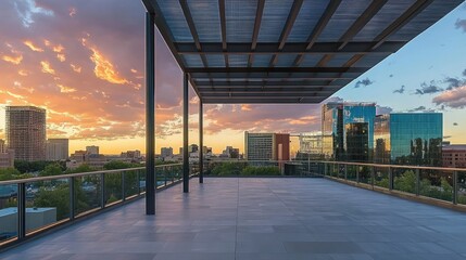 Urban rooftop deck with a sleek metal overhang and sunset views.