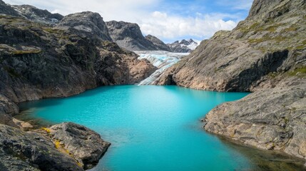 Stunning Turquoise Meltwater Lake Surrounded by Majestic Peaks