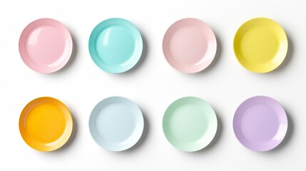 Colorful collection of round plates, isolated on white background