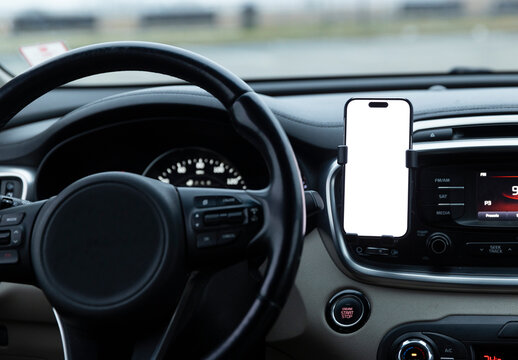 Blank Screen mobile phone in car holder dashboard 