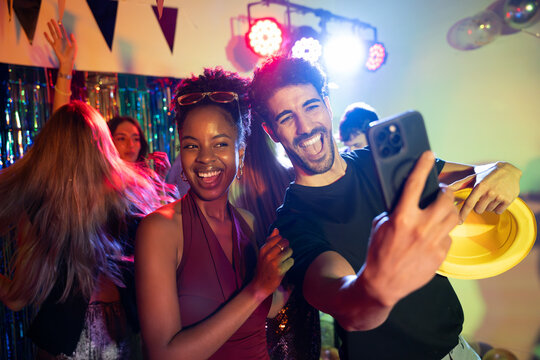 title: Capturing Fun Moments at a Lively Party With Friends