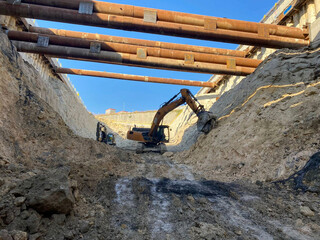 crusher breaks the ground at construction site