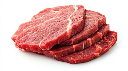 Fototapeta premium Freshly Cut Raw Beef Steak Slices Stacked Neatly on a White Background Ready for Cooking and Grilling in Culinary Dishes or Meal Preparations