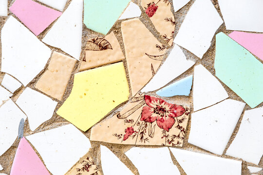 Detail of a broken ceramic tile wall in Barcelona