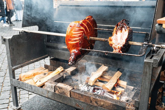Roasted Pork Knuckle Over Wood Fire At Prague Market