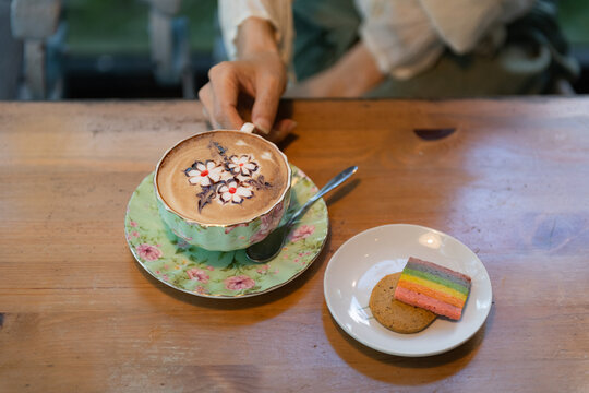 Beautiful Floral Latte Art with Colorful Dessert Treats