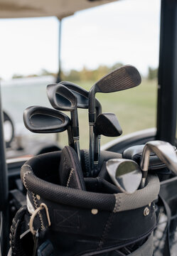 Teenage boy golfing