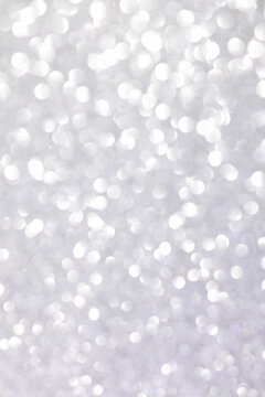 White bokeh circles forming a clean soft background.