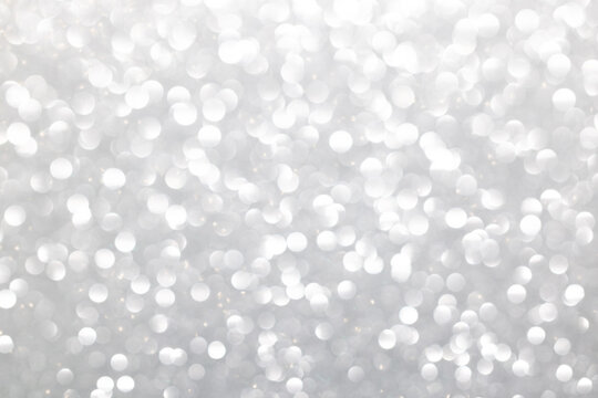 White bokeh circles background.