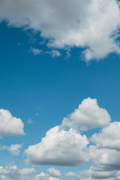 Clouds in blue sky vertical