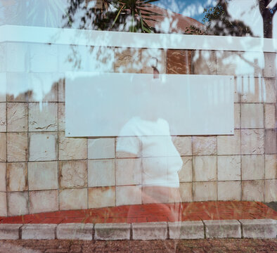 Double exposure of young woman taken on medium format film