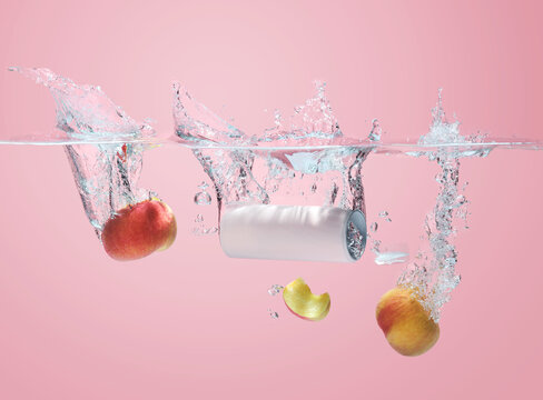 Refreshing Splash of Apples and Drink Can in Clear Water