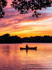 Serene Sunset Canoeing on Calm Lake with Colorful Reflections