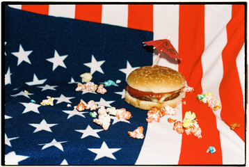 popcorn and burger and on a american towel, 35mm